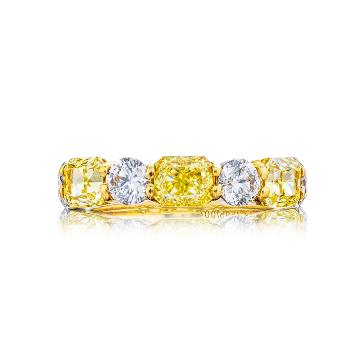 2.51ctw yellow radiant, 1.22ctw round diamonds in 18K Yellow Gold