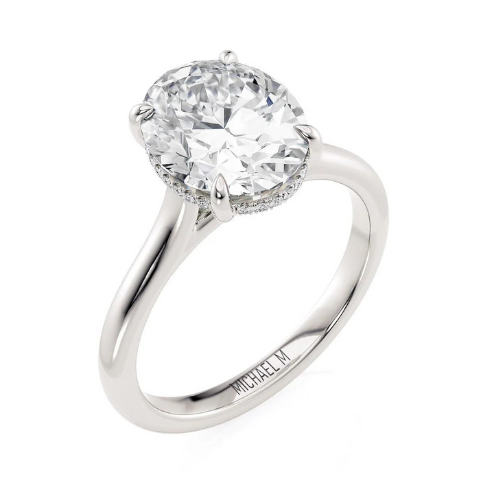 0.08ctw Oval-Cut Hidden Halo Diamond Solitaire