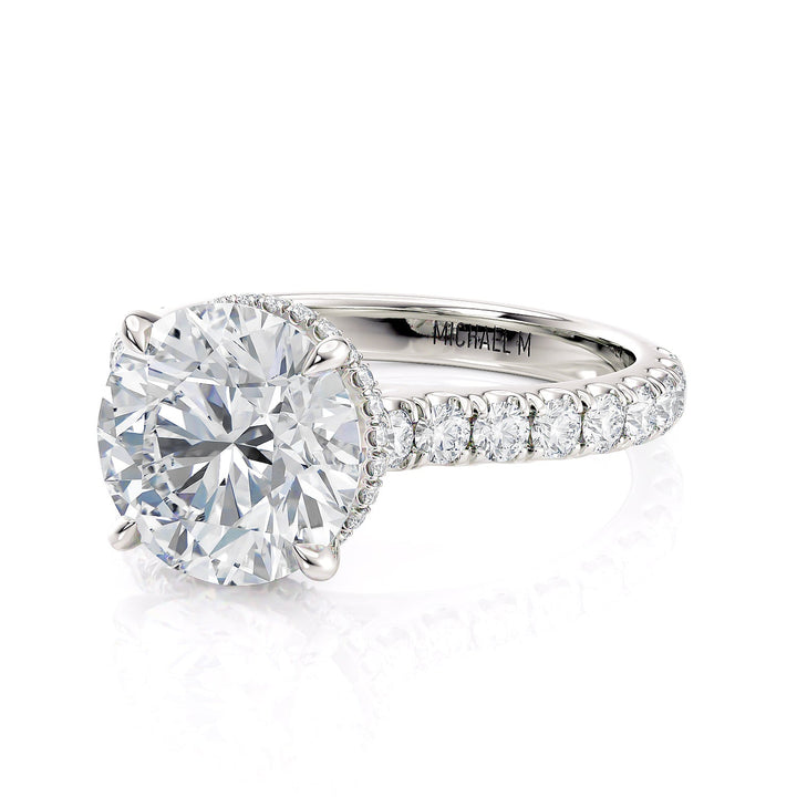 0.73ctw Diamond Halo Engagement Ring